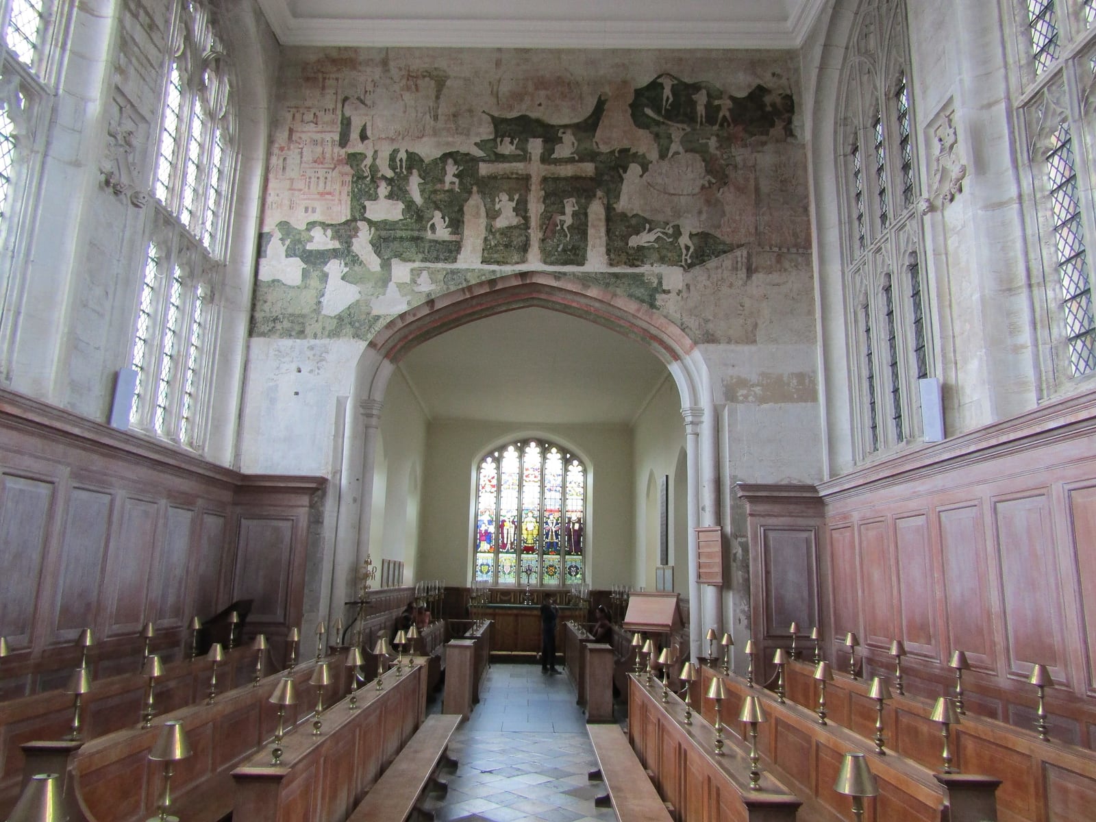 The nave of the Guild Chapel, Stratford, looking east, with the Doom painting above the chancel arch.