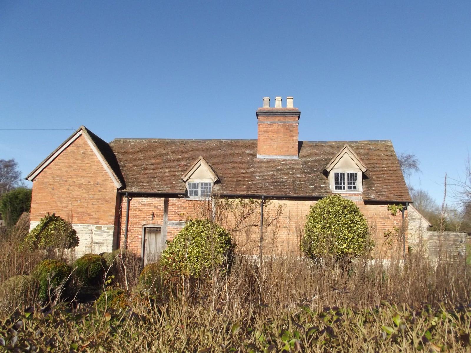 Glebe Farm at Wilmcote, a brick-encased timber-framed farmhouse, identified since 2000 as Mary Arden's childhood home.