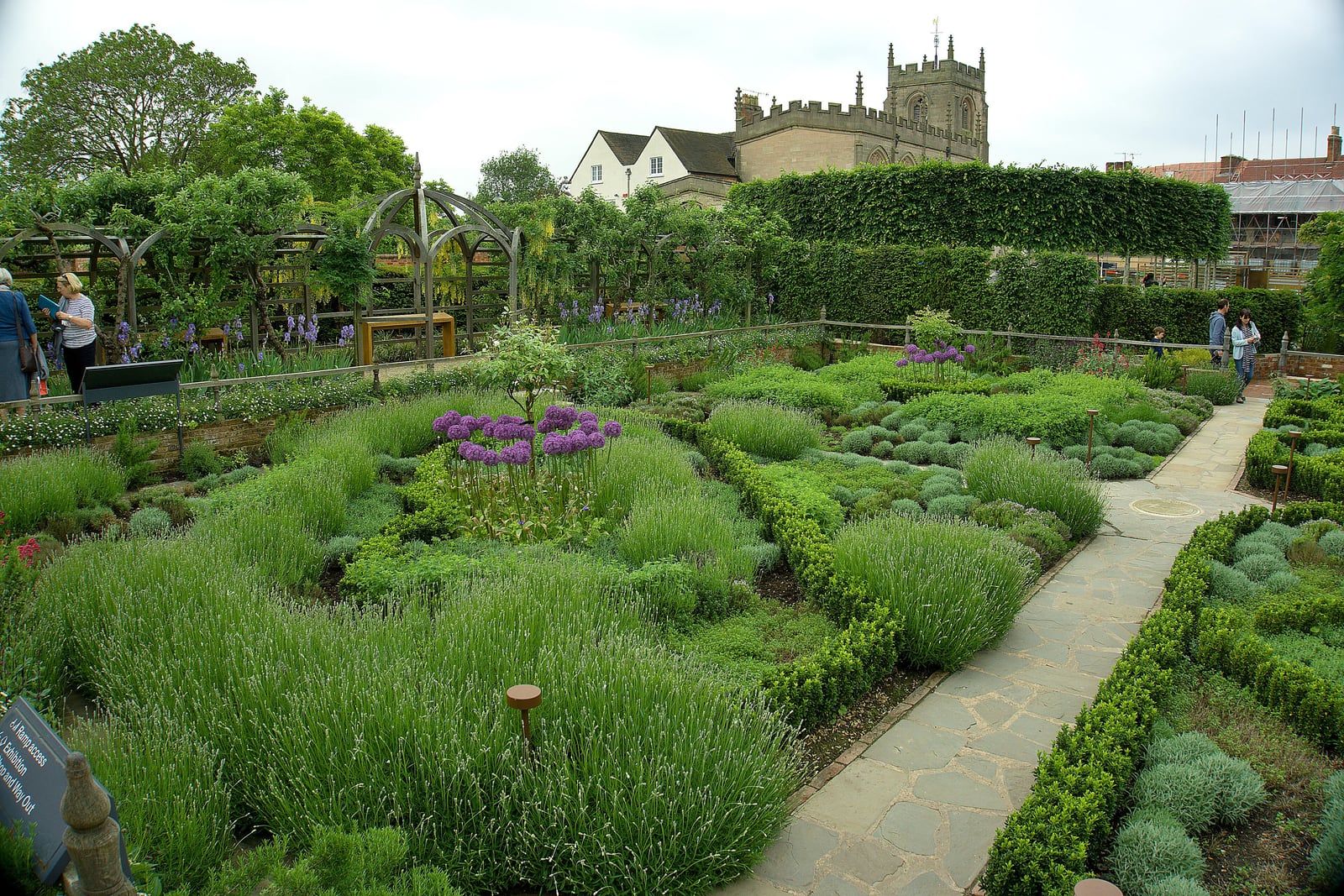 The knot garden on the site of New Place, Stratford, with the Guild Chapel tower behind.