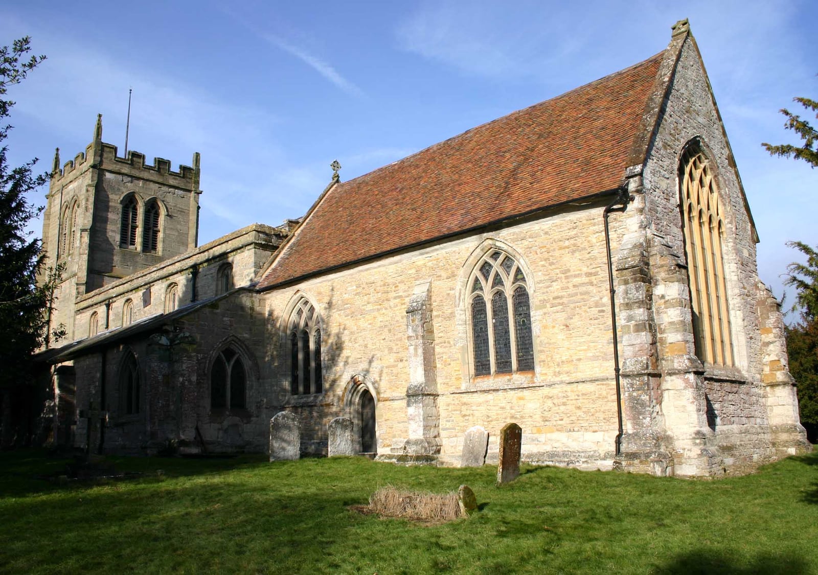 St James the Great, Snitterfield, Warwickshire, from the south in sunshine.