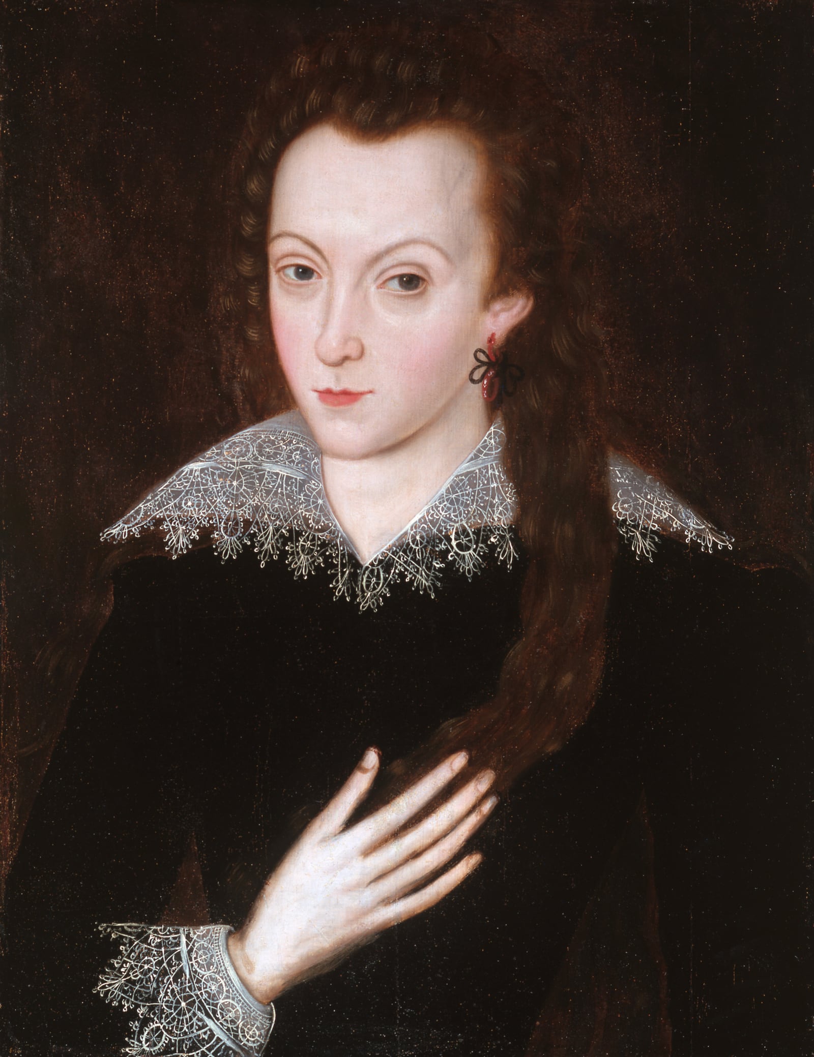 A 1590s portrait of Henry Wriothesley, third Earl of Southampton, with long hair and a lace collar.